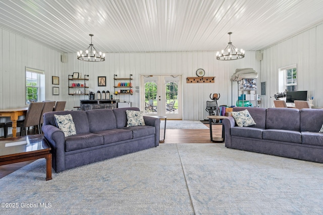 378 County Route 354, Rensselaerville, NY 12469 - living area with a chandelier, healthy amount of natural light, and wood finished floors