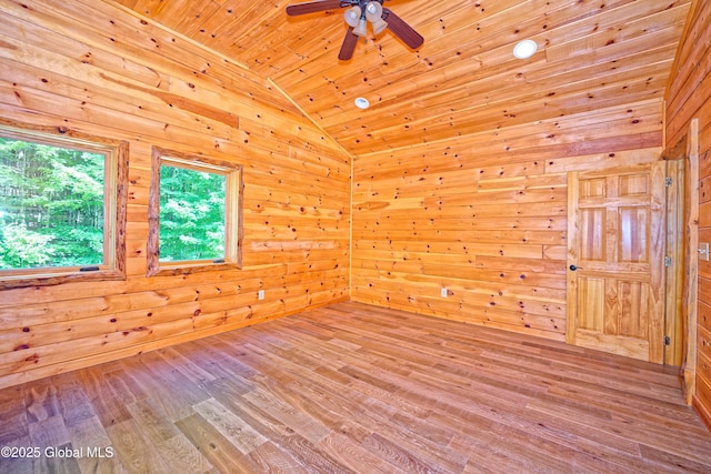 236 Colfax Rd, Jackson, NY 12816 - empty room with lofted ceiling, wood walls, a ceiling fan, wood finished floors, and wooden ceiling