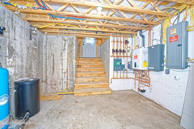 236 Colfax Rd, Jackson, NY 12816 - unfinished below grade area with electric panel, stairway, tankless water heater, and a water pressure tank