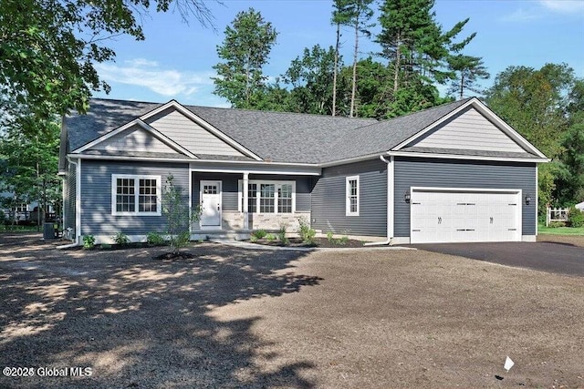 16 Surcingle Rd, Queensbury, NY 12804 - ranch-style home featuring a garage and driveway