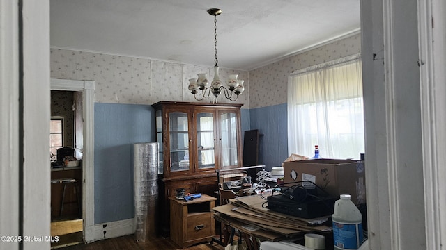 8 Main St, Hudson Falls, NY 12839 - dining room featuring wallpapered walls, a chandelier, dark wood-type flooring, a desk, and crown molding