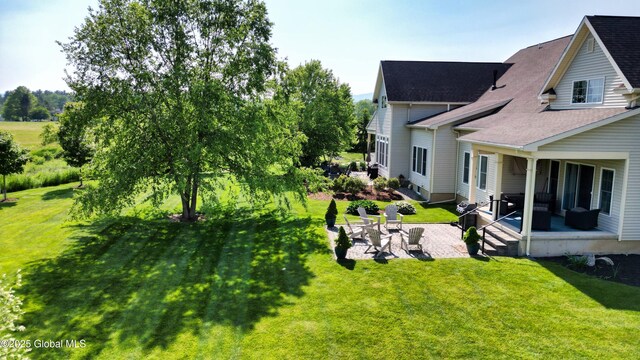 20 Beekman Pl, Queensbury, NY 12804 - view of grassy yard featuring a patio