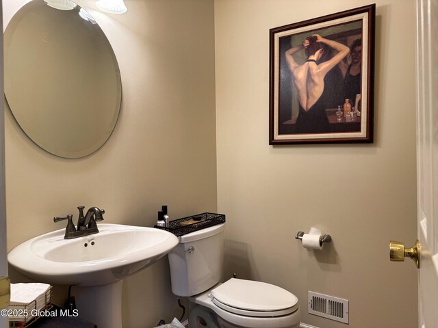 20 Beekman Pl, Queensbury, NY 12804 - half bathroom featuring toilet and baseboards