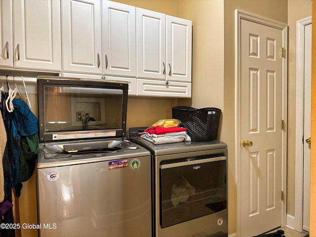 20 Beekman Pl, Queensbury, NY 12804 - washroom featuring cabinet space and separate washer and dryer