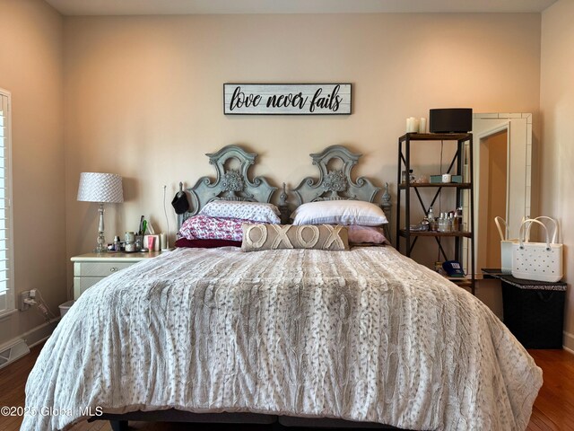 20 Beekman Pl, Queensbury, NY 12804 - bedroom featuring dark wood finished floors and baseboards