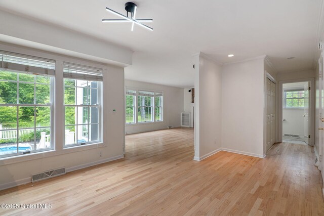 11 Boylston Dr, Bethlehem, NY 12054 - spare room with plenty of natural light and light wood-type flooring