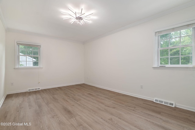 11 Boylston Dr, Bethlehem, NY 12054 - empty room featuring light wood-type flooring, healthy amount of natural light, and ornamental molding