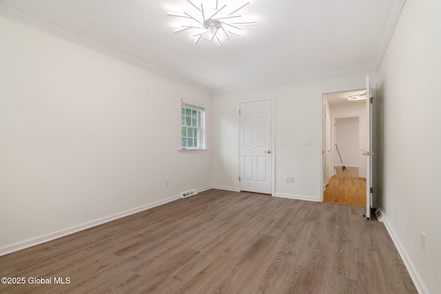 11 Boylston Dr, Bethlehem, NY 12054 - unfurnished bedroom featuring light wood-style floors and ornamental molding