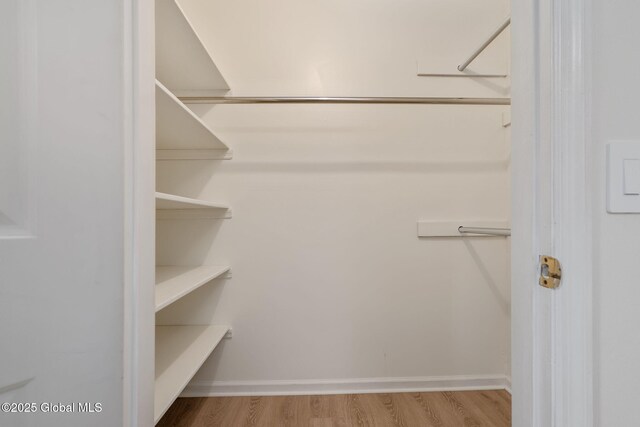 11 Boylston Dr, Bethlehem, NY 12054 - walk in closet featuring wood finished floors