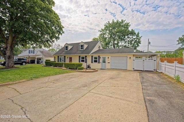 1038 Horvath St, Schenectady, NY 12303 - cape cod house with driveway, a garage, and a carport