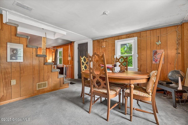 579 Camden Valley Rd, Salem, NY 12873 - carpeted dining area with wood walls and stairway