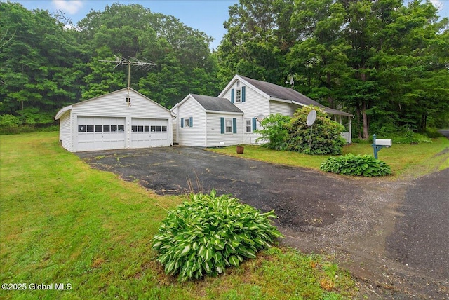 579 Camden Valley Rd, Salem, NY 12873 - view of front of property with an outbuilding, a detached garage, and a front yard