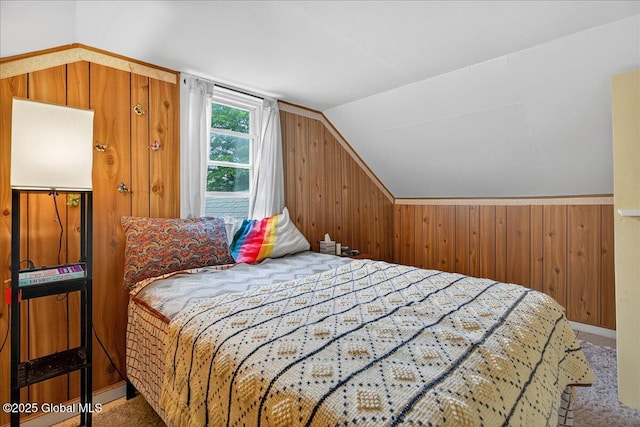 579 Camden Valley Rd, Salem, NY 12873 - bedroom featuring vaulted ceiling, wooden walls, and carpet
