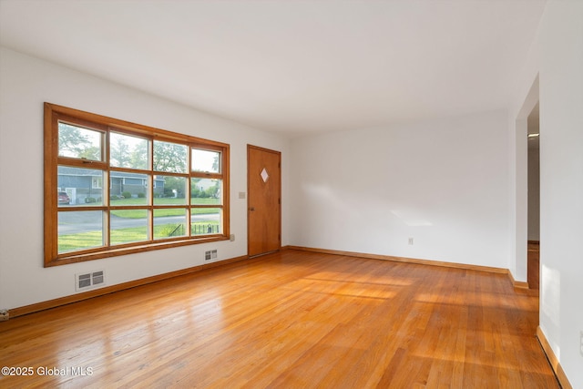 11 Drawbridge Dr, Guilderland, NY 12203 - empty room featuring light wood-style floors and baseboards