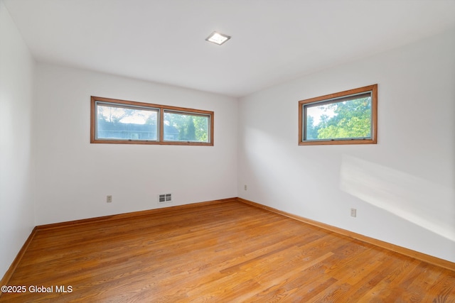 11 Drawbridge Dr, Guilderland, NY 12203 - empty room with light wood-type flooring and baseboards