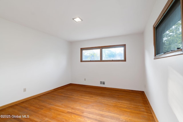 11 Drawbridge Dr, Guilderland, NY 12203 - empty room featuring light wood-style floors and baseboards