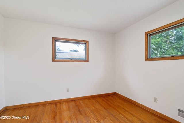 11 Drawbridge Dr, Guilderland, NY 12203 - empty room featuring light wood-style floors and baseboards
