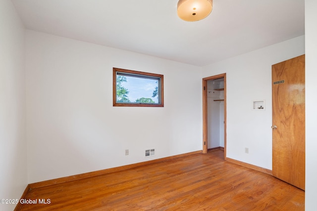 11 Drawbridge Dr, Guilderland, NY 12203 - unfurnished bedroom featuring light wood-style floors and baseboards