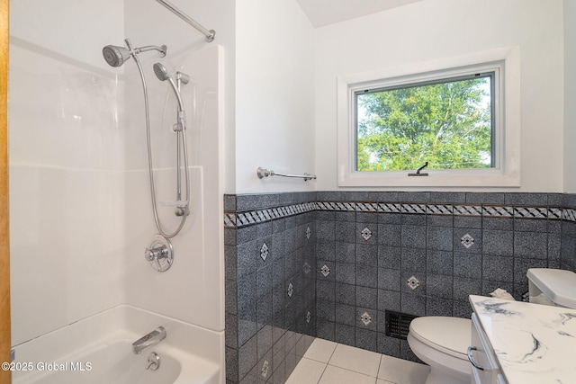 11 Drawbridge Dr, Guilderland, NY 12203 - full bath featuring tile walls, tile patterned floors, vanity, shower / bathtub combination, and a wainscoted wall