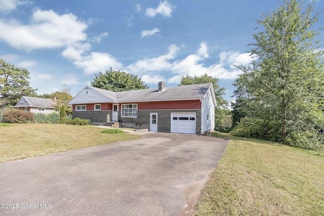 11 Drawbridge Dr, Guilderland, NY 12203 - view of front facade with a garage, asphalt driveway, stone siding, a chimney, and a front lawn
