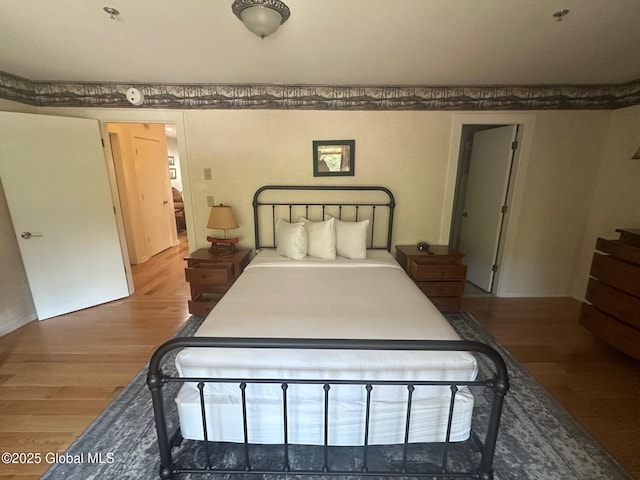110 Sagamore Rd Unit 6B5, Bolton, NY 12814 - bedroom featuring wood finished floors and baseboards
