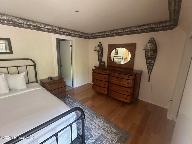 110 Sagamore Rd Unit 6B5, Bolton, NY 12814 - bedroom with wood finished floors