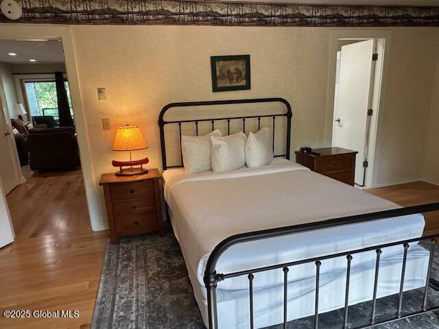 110 Sagamore Rd Unit 6B5, Bolton, NY 12814 - bedroom featuring wood finished floors