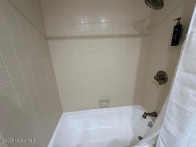 110 Sagamore Rd Unit 6B5, Bolton, NY 12814 - bathroom with shower / bathtub combination with curtain