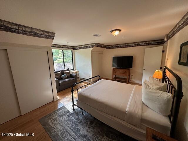 110 Sagamore Rd Unit 6B5, Bolton, NY 12814 - bedroom featuring wood finished floors