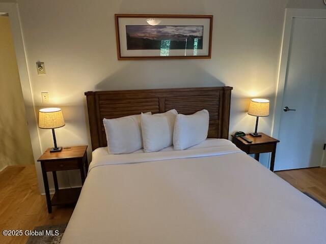 110 Sagamore Rd Unit 6B5, Bolton, NY 12814 - bedroom with wood finished floors