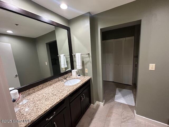 110 Sagamore Rd Unit 6B5, Bolton, NY 12814 - bathroom featuring baseboards and vanity