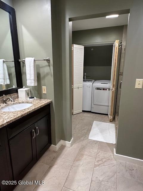 110 Sagamore Rd Unit 6B5, Bolton, NY 12814 - bathroom with washer and clothes dryer and vanity