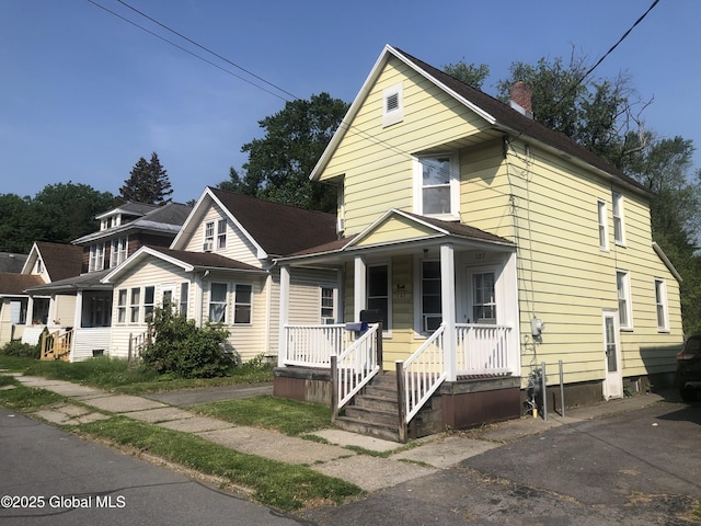 127 N Toll St, Scotia, NY 12302 - traditional style home featuring covered porch and a chimney