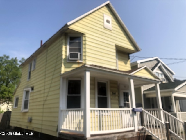 127 N Toll St, Scotia, NY 12302 - view of front facade featuring covered porch and cooling unit