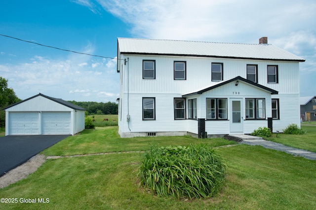 798 State Highway 29, Broadalbin, NY 12025 - view of front of home with a detached garage, a chimney, a front lawn, and an outbuilding
