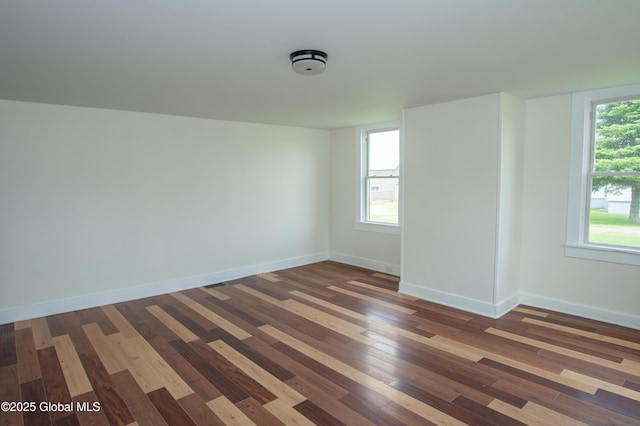 798 State Highway 29, Broadalbin, NY 12025 - empty room with dark wood finished floors and baseboards