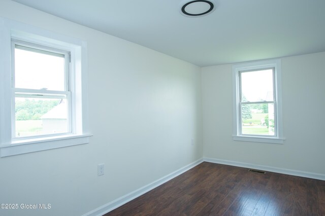 798 State Highway 29, Broadalbin, NY 12025 - spare room with dark wood-type flooring and baseboards