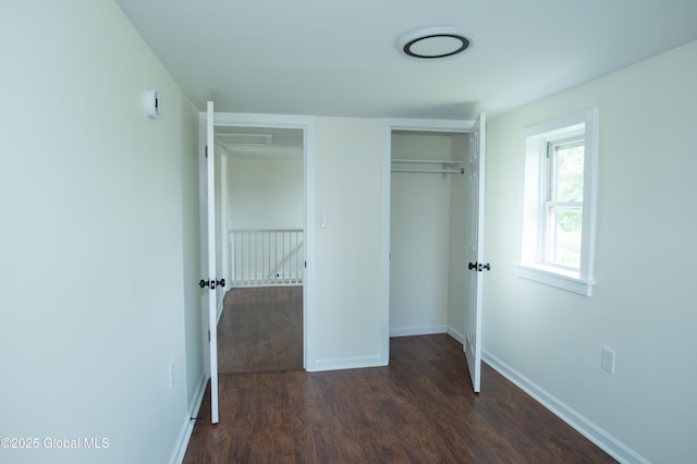 798 State Highway 29, Broadalbin, NY 12025 - unfurnished bedroom featuring dark wood-style floors and a closet