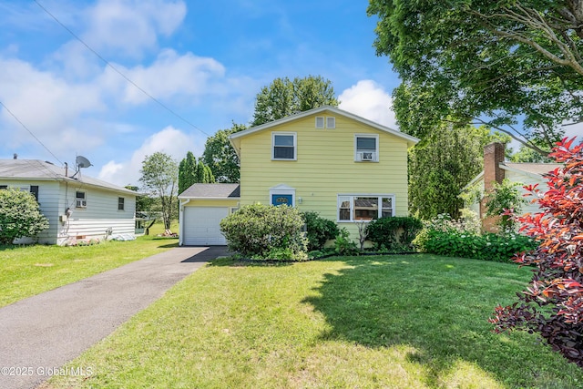 35 Magee Dr, Bethlehem, NY 12077 - traditional-style home with driveway and a front lawn