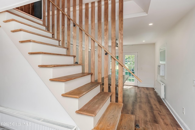 35 Magee Dr, Bethlehem, NY 12077 - stairway with wood finished floors, recessed lighting, and radiator heating unit