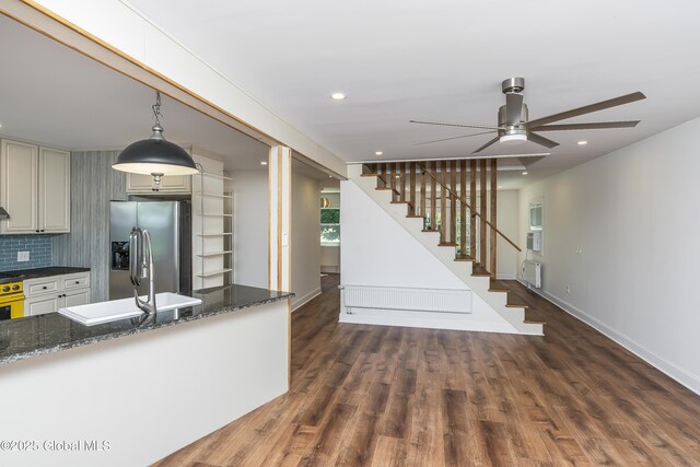 35 Magee Dr, Bethlehem, NY 12077 - kitchen featuring stainless steel fridge, ceiling fan, wood finished floors, dark stone counters, and recessed lighting