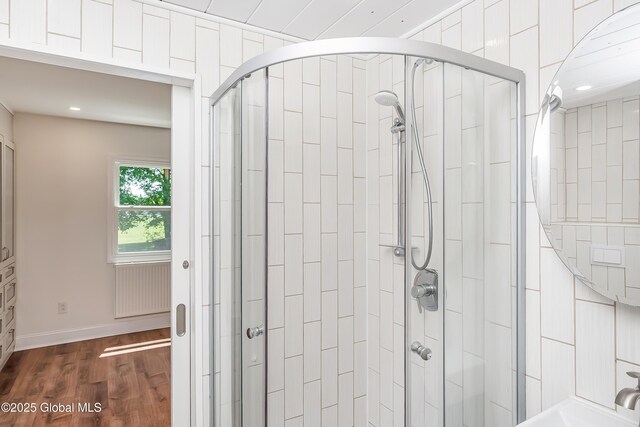 35 Magee Dr, Bethlehem, NY 12077 - bathroom with a stall shower, wood finished floors, and recessed lighting