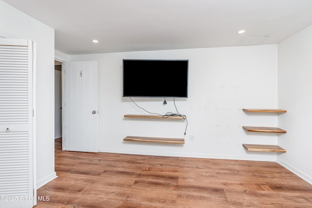 35 Magee Dr, Bethlehem, NY 12077 - unfurnished living room featuring wood finished floors and recessed lighting