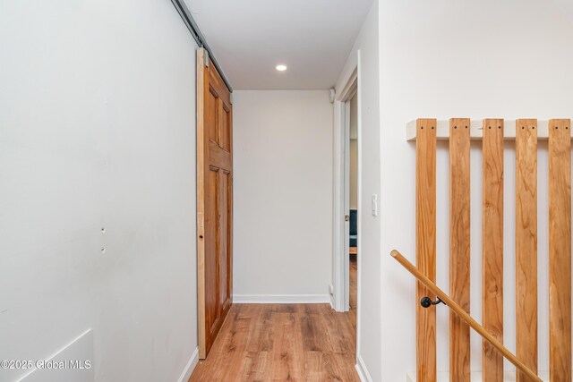 35 Magee Dr, Bethlehem, NY 12077 - corridor featuring light wood finished floors, recessed lighting, and a barn door