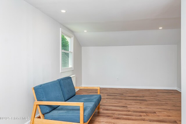 35 Magee Dr, Bethlehem, NY 12077 - sitting room featuring wood finished floors, vaulted ceiling, and recessed lighting