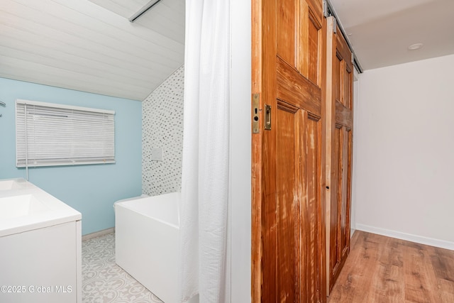 35 Magee Dr, Bethlehem, NY 12077 - bathroom with a tub and vanity