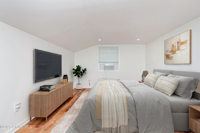 35 Magee Dr, Bethlehem, NY 12077 - bedroom featuring light wood finished floors, cooling unit, recessed lighting, and lofted ceiling