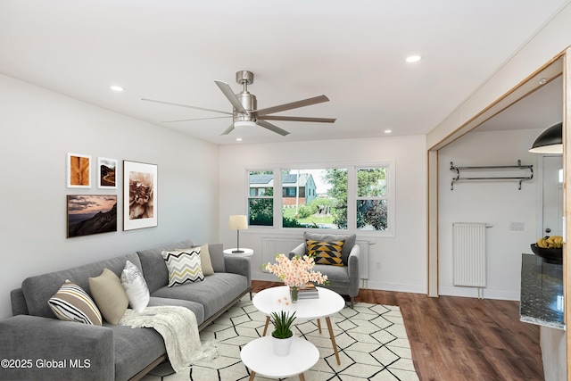 35 Magee Dr, Bethlehem, NY 12077 - living room with radiator, wood finished floors, ceiling fan, and recessed lighting