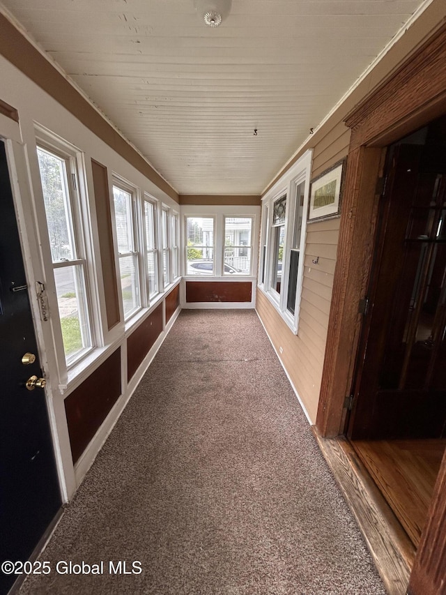 528 Harrison Ave, Schenectady, NY 12306 - unfurnished sunroom with carpet flooring and wood ceiling