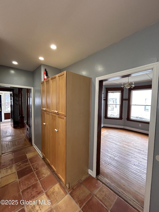 528 Harrison Ave, Schenectady, NY 12306 - hall featuring a chandelier, recessed lighting, and a baseboard radiator